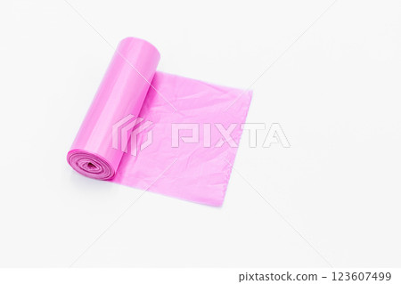 Roll of pink plastic garbage bags on white background, Pink color garbage bags roll, Roll of pink plastic garbage bags on white background. Roll of pink plastic garbage bags on white background, Pink color garbage bags roll, Roll of pink plastic garbage bags on white background. 123607499