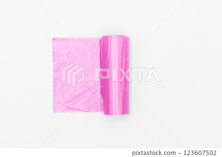 Roll of pink plastic garbage bags on white background, Pink color garbage bags roll, Roll of pink plastic garbage bags on white background. Roll of pink plastic garbage bags on white background, Pink color garbage bags roll, Roll of pink plastic garbage bags on white background. 123607502