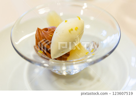 Vanilla ice cream and chocolate cream in a glass 123607519