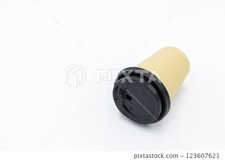 Brown paper coffee cup with black lid on white background, Brown paper cup blank coffee cup for takeaway on white background, Brown empty paper cup for coffee eco coffee cafe. Brown paper coffee cup with black lid on white background, Brown paper cup blank coffee cup for takeaway on white background, Brown empty paper cup for coffee eco coffee cafe. 123607621