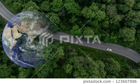 Aerial view EV car electric vehicle car alternative sustainable energy eco power,  EV car electric vehicle car on middle green tree forest road with globe earth planet, Alternative sustainable energy. 123607986