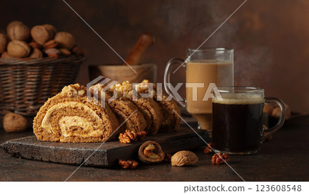 Walnut and buttercream roll: a traditional Oriental pastry. Walnut and buttercream roll: a traditional Oriental pastry. 123608548