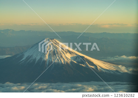 Beautiful Mount Fuji illuminated by the morning sun seen from above (aerial view) 123610282