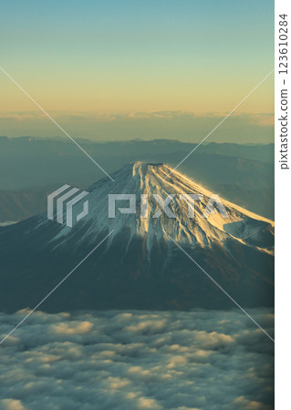 Beautiful Mount Fuji illuminated by the morning sun seen from above (aerial view) 123610284