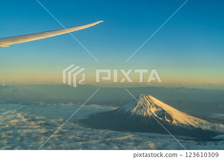 Mt. Fuji in winter with the morning sun on a flight over Mt. Fuji (aerial view) 123610309
