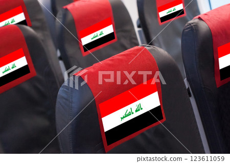 Iraqi Flag on Empty seat in plane. Travel, flight and transportration in Iraq concept 123611059