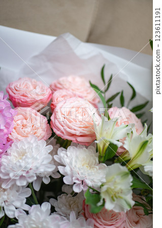 Beautiful bouquet of flowers. Vibrant Floral Arrangement Featuring a Variety of Colorful Blooms Beautiful bouquet of flowers. Vibrant Floral Arrangement Featuring a Variety of Colorful Blooms 123611191