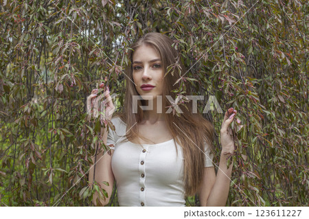 Young spring lady. Beautiful woman outdoors portrait Young spring lady. Beautiful woman outdoors portrait 123611227