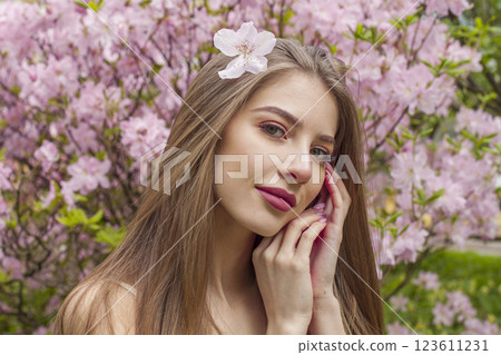 Gorgeous spring lady. Beautiful woman outdoors portrait 123611231