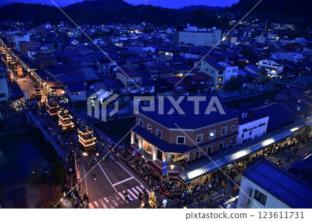 Takayama City, Gifu Prefecture, Japan: Spring Takayama Festival Night Festival: Lantern floats parading after sunset: Aerial view of the street 123611731