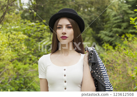 Good-looking spring lady. Beautiful woman outdoors portrait 123612508