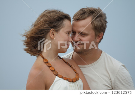 Happy couple close up portrait outdoors 123612575