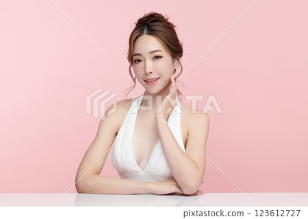 Beautiful young asian woman with clean fresh skin on pink background, Face care, Facial treatment, Cosmetology, beauty and spa, Asian women portrait. 123612727