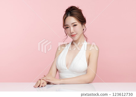 Beautiful young asian woman with clean fresh skin on pink background, Face care, Facial treatment, Cosmetology, beauty and spa, Asian women portrait. 123612730