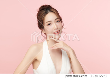 Beautiful young asian woman with clean fresh skin on pink background, Face care, Facial treatment, Cosmetology, beauty and spa, Asian women portrait. 123612732
