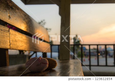 On a bench at the station On a bench at the station 123612854