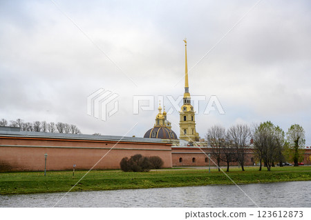 Spire and dome of Peter and Paul Cathedral and fortress wall in St. Petersburg, Russia, in autumn 123612873