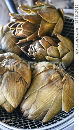 Steamed Artichokes Close-Up, Rustic Kitchen Style, Healthy Cooking Concept Steamed Artichokes Close-Up, Rustic Kitchen Style, Healthy Cooking Concept 123612912