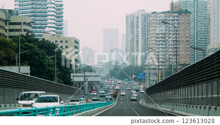 Chengdu, Sichuan, China. Smog Over City. High-rise Houses Elevated View Cityscape Skyline On Background. Urban Residential Areas. Real Estate, Development Industry. Heavy Car Traffic 123613028