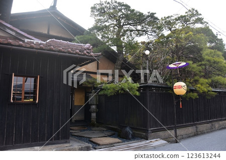 Old townscape of Takayama City, Gifu Prefecture, Japan. During the Spring Takayama Festival, old houses exuding a sense of history and lanterns placed on the road. Old townscape of Takayama City, Gifu Prefecture, Japan. During the Spring Takayama Festival, old houses exuding a sense of history and lanterns placed on the road. 123613244