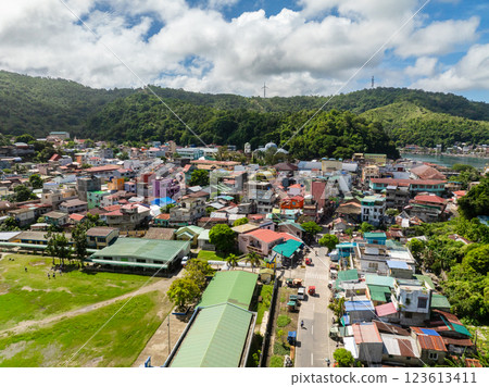 Costal town city with streets and houses. Romblon Island, Romblon, Philippines. Costal town city with streets and houses. Romblon Island, Romblon, Philippines. 123613411