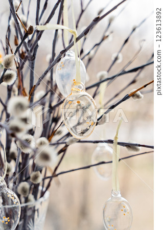 Willow Sunday centerpiece draws eyes to delicate catkins gently swaying by bright window, catkins offering symbol of new life, catkins embracing timeless cultural tradition, embracing faith Willow Sunday centerpiece draws eyes to delicate catkins gently swaying by bright window, catkins offering symbol of new life, catkins embracing timeless cultural tradition, embracing faith 123613892