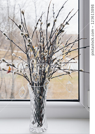 Willow Sunday arrangement in crystal vase celebrates peaceful spring devotion, willow branches highlighting seasonal reverence, willow essence reflecting cherished holiday orthodox tradition Willow Sunday arrangement in crystal vase celebrates peaceful spring devotion, willow branches highlighting seasonal reverence, willow essence reflecting cherished holiday orthodox tradition 123613898