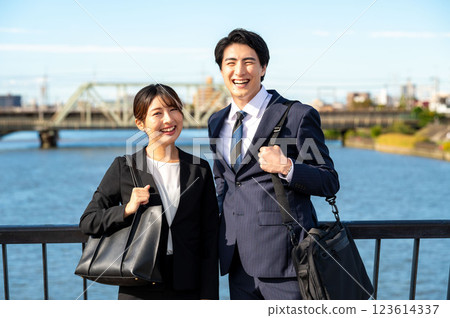 Businessmen laughing side by side Businessmen laughing side by side 123614337