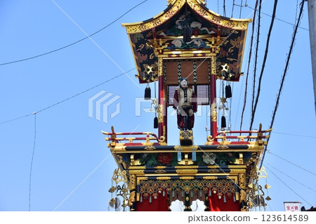 Takayama City, Gifu Prefecture, Japan - Spring Takayama Festival - Parade of Karako doll floats and gorgeous decorations - The surrounding streets and beautiful blue sky 123614589