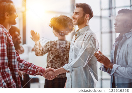 Young, motivated and experienced employees are brainstorming in the conference room. 123616268