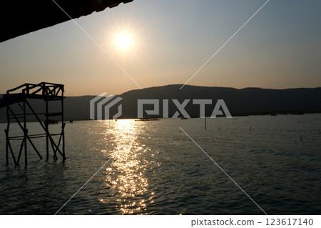 Beautiful Isle of Skye sunset with the Cuillin mountains reflecting in a calm Vietnam Phu Quoc Island  123617140
