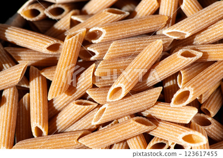 Whole wheat penne rigate, top vie Whole wheat penne rigate, top vie 123617455