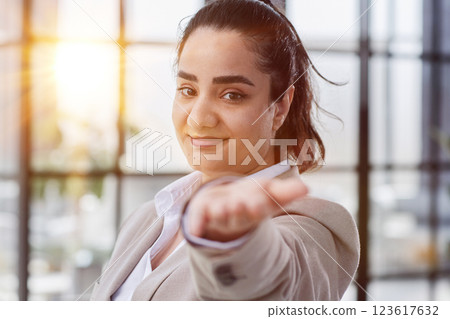 portrait of a young beautiful blonde business woman in the office 123617632