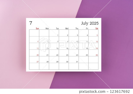 July 2025 calendar page on purple two tone color background. July 2025 calendar page on purple two tone color background. 123617692