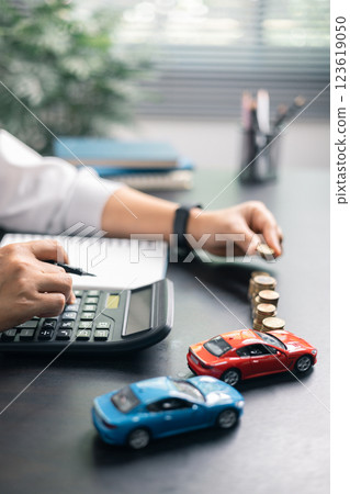 Finance bank tax expense accounting budget money businessman hand for Business expense analysis saving use car Financial calculate accountant close up calculator with graph chart write office desk Finance bank tax expense accounting budget money businessman hand for Business expense analysis saving use car Financial calculate accountant close up calculator with graph chart write office desk 123619050