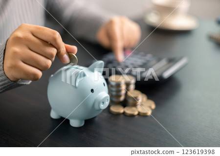 Finance bank tax expense accounting budget money businessman hand use calculator Financial calculate accountant close up calculator with graph chart write office desk Business expense analysis saving Finance bank tax expense accounting budget money businessman hand use calculator Financial calculate accountant close up calculator with graph chart write office desk Business expense analysis saving 123619398