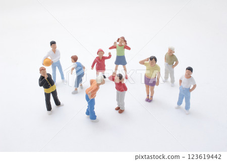 Group of Miniature People Figures Representing Community Group of Miniature People Figures Representing Community 123619442