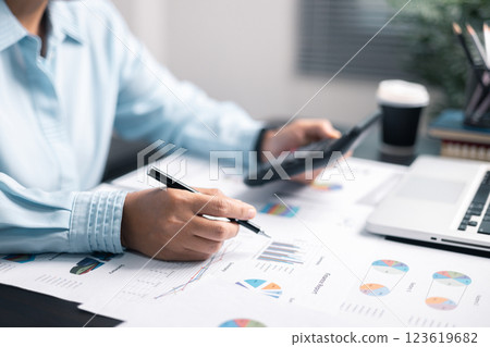 Finance bank tax expense accounting budget money businessman hand use calculator Financial calculate accountant close up calculator with graph chart write office desk Business expense analysis saving Finance bank tax expense accounting budget money businessman hand use calculator Financial calculate accountant close up calculator with graph chart write office desk Business expense analysis saving 123619682