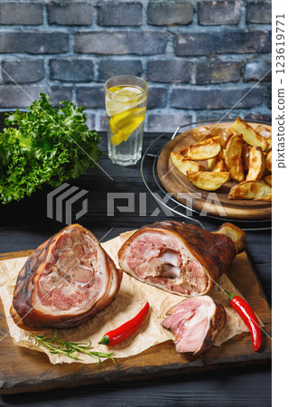 Smoked pork knuckle, ham hock on cutting board 123619771