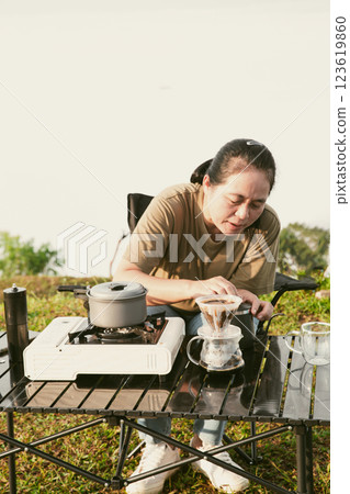 Morning coffee concept of cafe focus on nurturing coffee in harmony with nature organic seed create warm cup caffeine background green fresh great outdoor. aromatic drink rich aroma of rising from mug Morning coffee concept of cafe focus on nurturing coffee in harmony with nature organic seed create warm cup caffeine background green fresh great outdoor. aromatic drink rich aroma of rising from mug 123619860