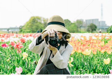 Photographing tulips at Adachi Ward Agricultural Park Photographing tulips at Adachi Ward Agricultural Park 123619898