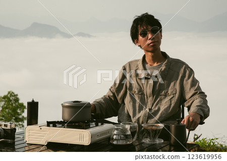 Morning coffee concept of cafe focus on nurturing coffee in harmony with nature organic seed create warm cup caffeine background green fresh great outdoor. aromatic drink rich aroma of rising from mug 123619956