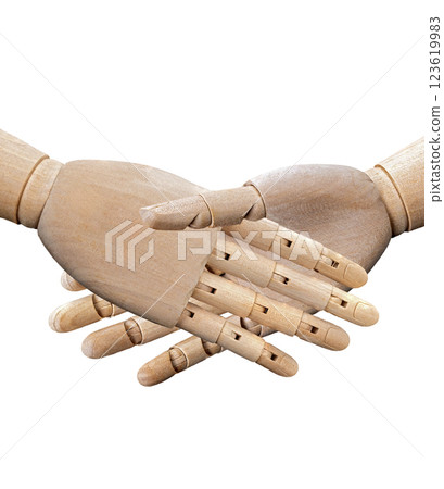 Handshake between two puppet hands made of wood is a concept of hand gesture on a white. Handshake between two puppet hands made of wood is a concept of hand gesture on a white. 123619983