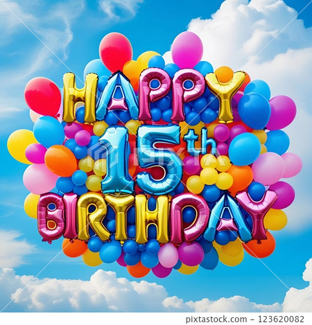 Happy 15th birthday balloons floating in the sky.  123620082