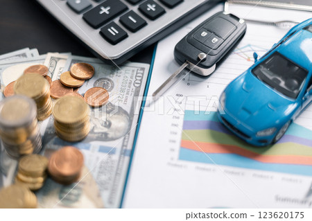 Finance bank tax expense accounting budget money businessman hand for Business expense analysis saving use car Financial calculate accountant close up calculator with graph chart write office desk 123620175