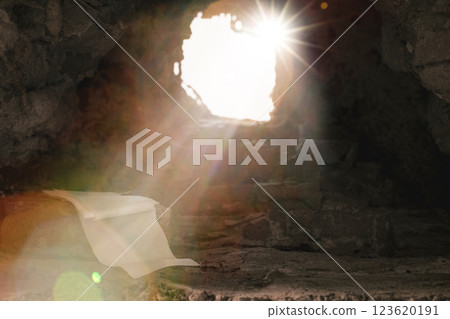 Easter resurrection concept. Jesus Christ resurrection. Empty tomb of Jesus with light. Born to Die, Rise. savior messiah redeemer gospel alive miracle. Christian religion. He is not here he is risen 123620191