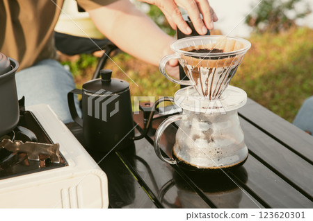 Morning coffee concept of cafe focus on nurturing coffee in harmony with nature organic seed create warm cup caffeine background green fresh great outdoor. aromatic drink rich aroma of rising from mug 123620301