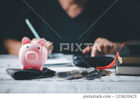 Saving money coin with banking investment, finance education concept. Planning student loan for studying abroad for college or university degree. Future children's education fund cash. Growing 123620423