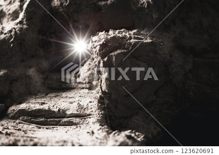 Easter resurrection concept. Jesus Christ resurrection. Empty tomb of Jesus with light. Born to Die, Rise. savior messiah redeemer gospel alive miracle. Christian religion. He is not here he is risen 123620691
