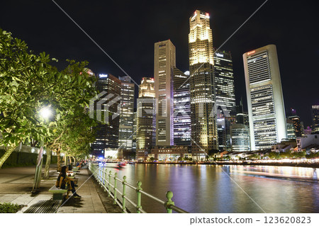 Night view of the skyscrapers in the Financial District of Boat Quay along the Singapore River. Night view of the skyscrapers in the Financial District of Boat Quay along the Singapore River. 123620823